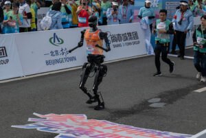 Robots Race in Human-Like Marathon